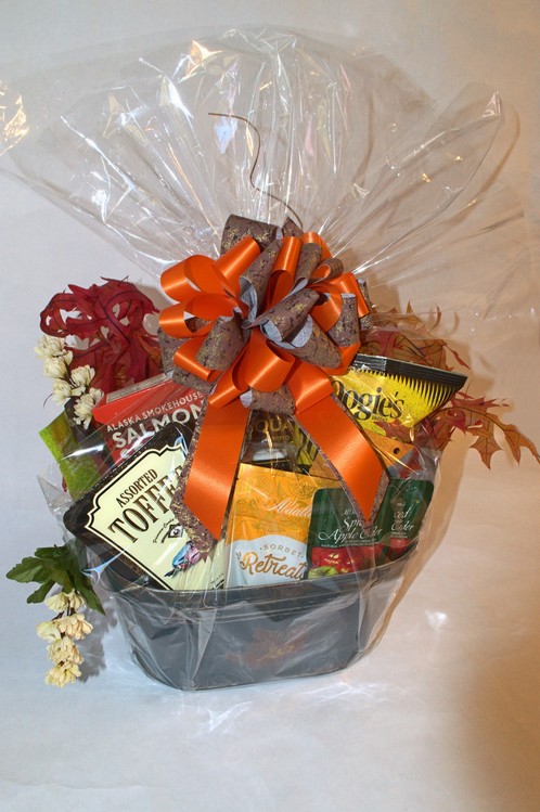 an arrangement of goodies in a lovely autumn themed tin
