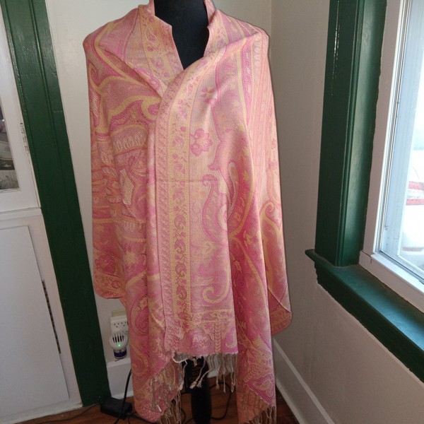 a peachy color and modified paisley designs stand out from the crowd.