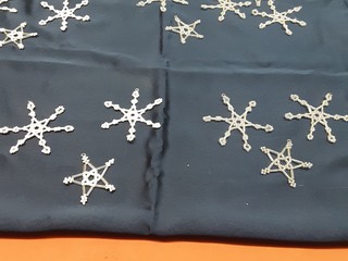 picture of woven bead snowflake and star ornaments
