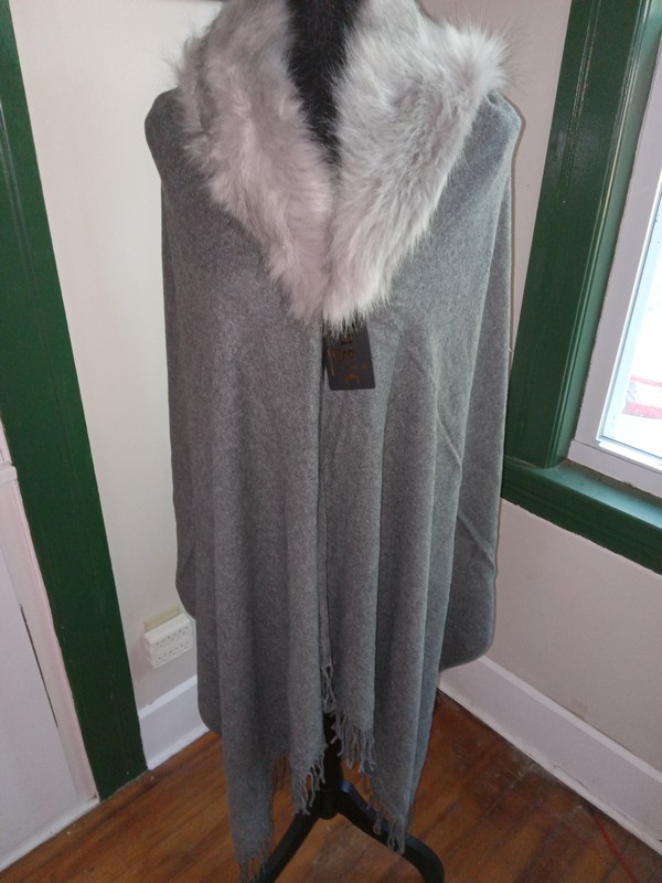 image of grey faux fur trimmed cape