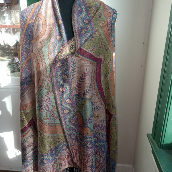 harmonious colors with leaf and blossom designs throughout.