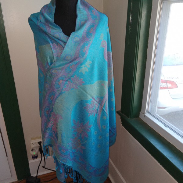 the intense turquoise background is what really makes a statement.